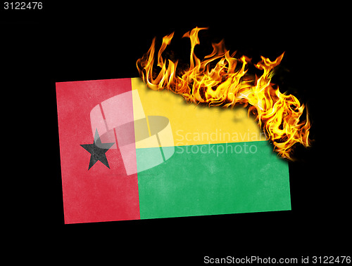 Image of Flag burning - Guinea Bissau