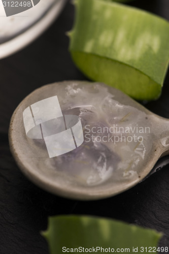 Image of aloe vera juice with fresh leaves 