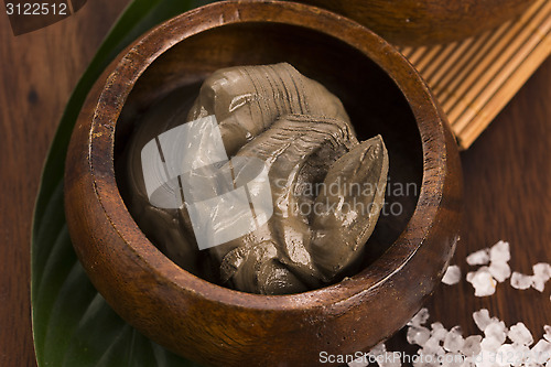 Image of Dead Sea mud and salt in a bowl