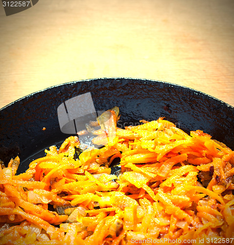 Image of roasted carrots and onions