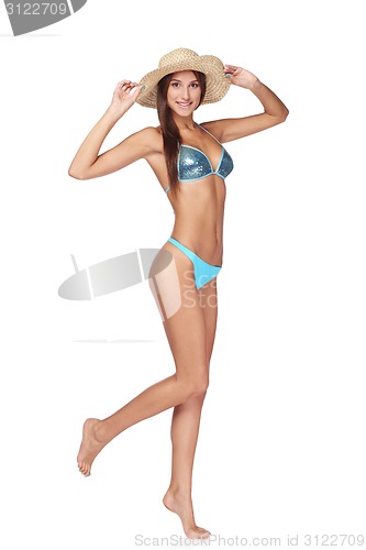 Image of Full length beautiful slim woman in blue bikini