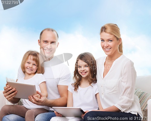 Image of happy family with tablet pc computers