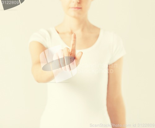 Image of woman with finger up