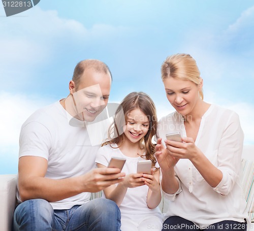 Image of happy family with smartphones