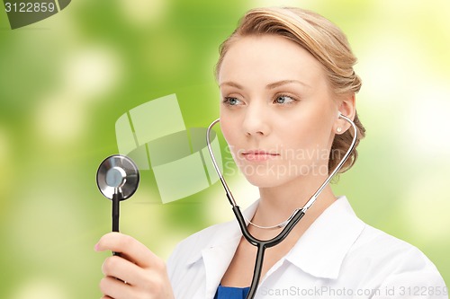 Image of young female doctor with stethoscope