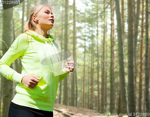 Image of happy woman running or jogging