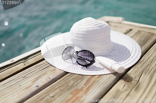 Image of close up of beach accessories at seaside