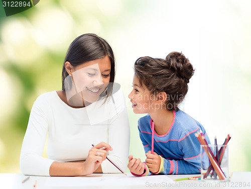 Image of mother and daughter drawing