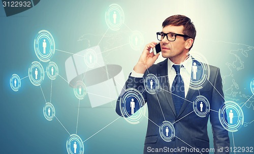 Image of buisnessman with cell phone