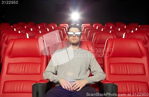 Image of young man watching movie in 3d theater