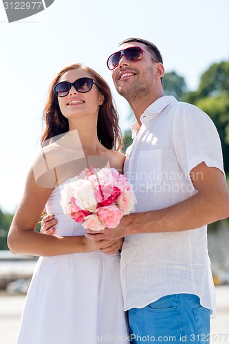 Image of smiling couple in city