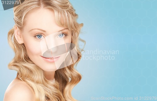 Image of face of beautiful young happy woman with long hair