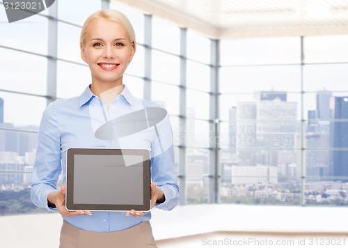 Image of smiling businesswoman or student with tablet pc