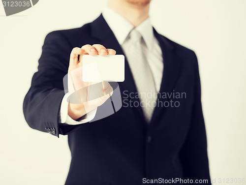 Image of man hand with blank paper