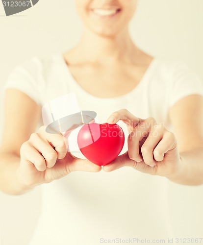 Image of woman hands with heart