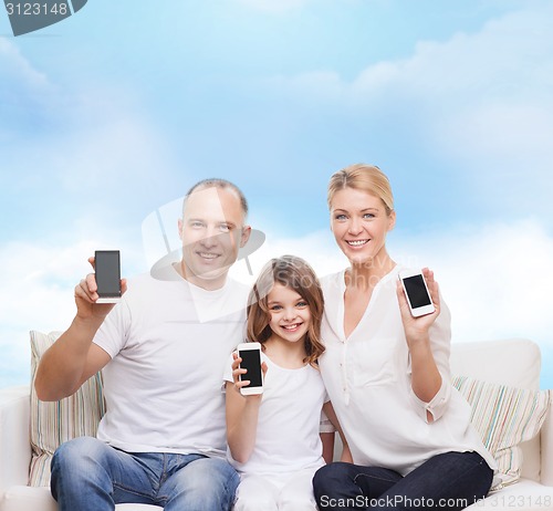 Image of happy family with smartphones