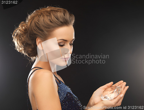 Image of woman with big diamond