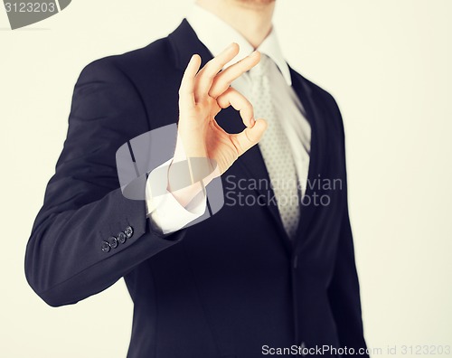 Image of man hands showing ok sign