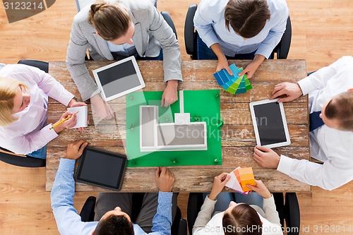 Image of close up of business team with project layout