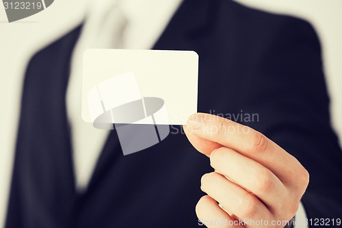 Image of man hand with blank paper