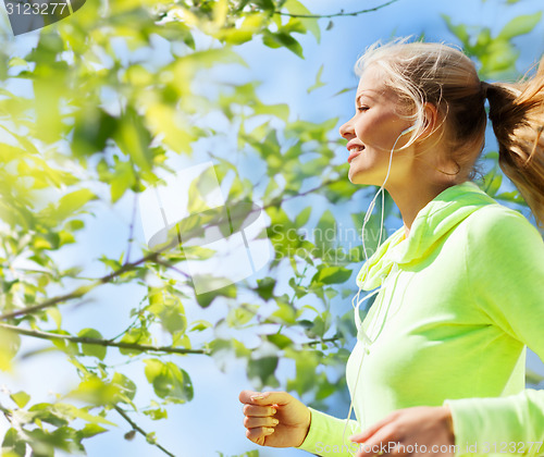 Image of woman jogging outdoors