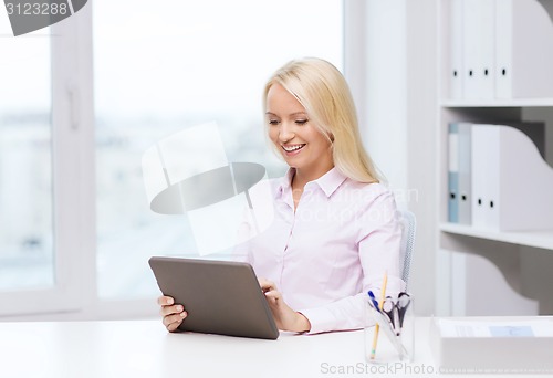 Image of smiling businesswoman or student with tablet pc