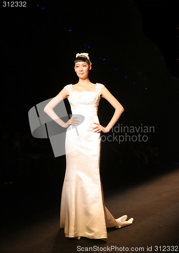 Image of Wedding dress model walking the catwalk at Seoul Collection (Fas