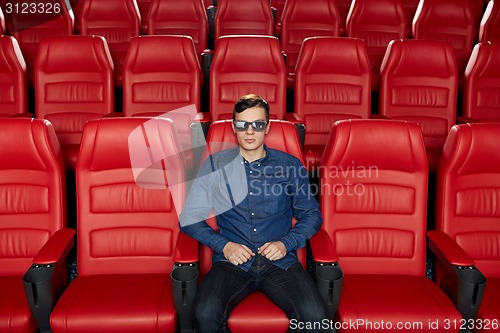 Image of young man watching movie in 3d theater