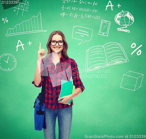 Image of smiling student girl showing thumbs up
