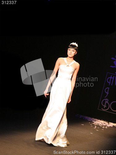 Image of Wedding dress model walking the catwalk at Seoul Collection (Fas