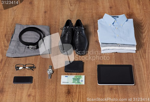 Image of close up of formal clothes and personal stuff