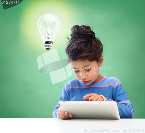 Image of little girl with tablet pc at school