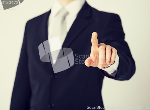 Image of man hand pointing at something