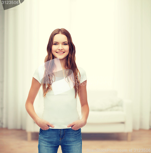 Image of smiling teenager in blank white t-shirt