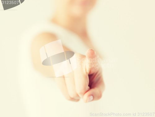 Image of woman pointing her finger at you