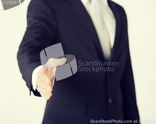 Image of businessman with open hand