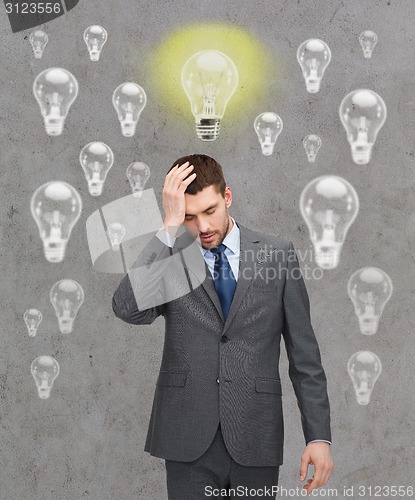 Image of handsome businessman having problems