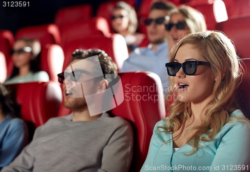 Image of friends watching horror movie in 3d theater