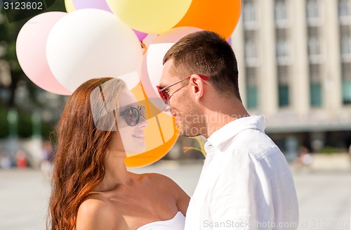 Image of smiling couple in city