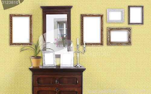 Image of yellow wall with picture frame