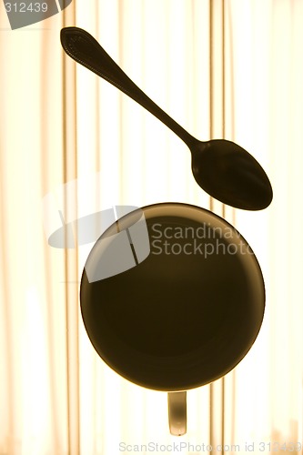 Image of Coffee cup and the spoon