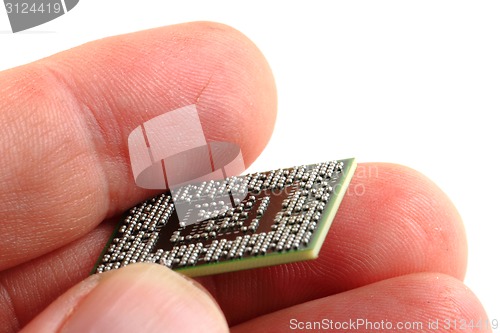 Image of microprocessor in human hand