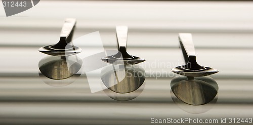 Image of The three silver spoons