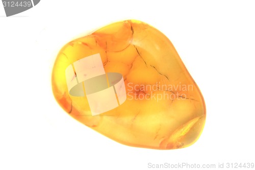 Image of yellow amber gem isolated 