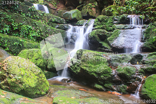 Image of waterfall and rocks covered with moss