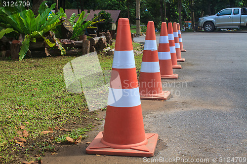 Image of traffic warning cone  in parking area