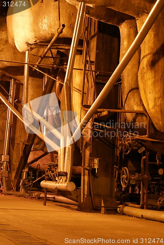 Image of different size and shaped pipes at a power plant