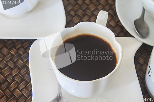 Image of  black  coffee on wooden table