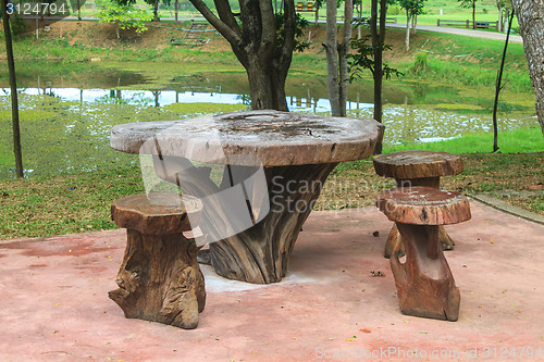 Image of Wooden table and chairs in the garden