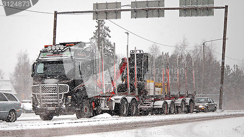 Image of Volvo FH16 580 Logging Truck in Snowfall